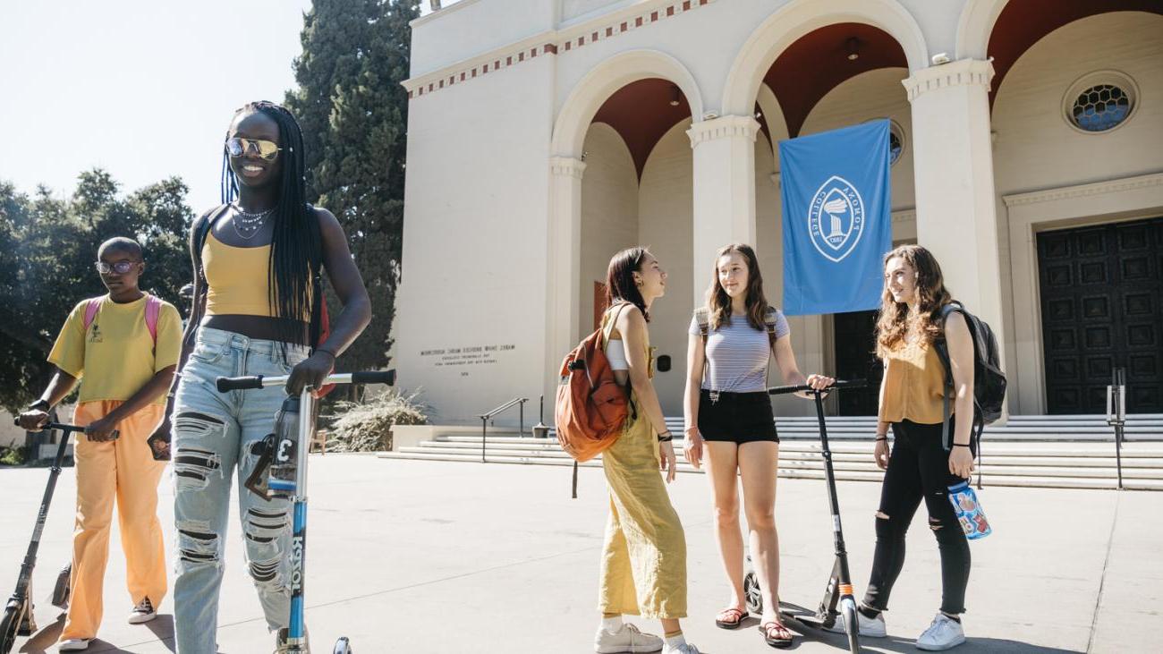 Students stand in front of Big Bridges